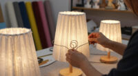 atelier oï and A-POC ABLE ISSEY MIYAKE sculpt lamps from wire and pleated cloth